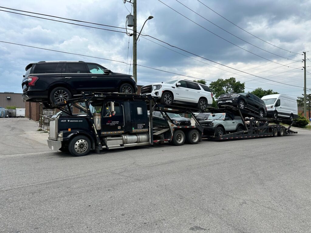 Autocarrierblacktractorcloudscarsvans